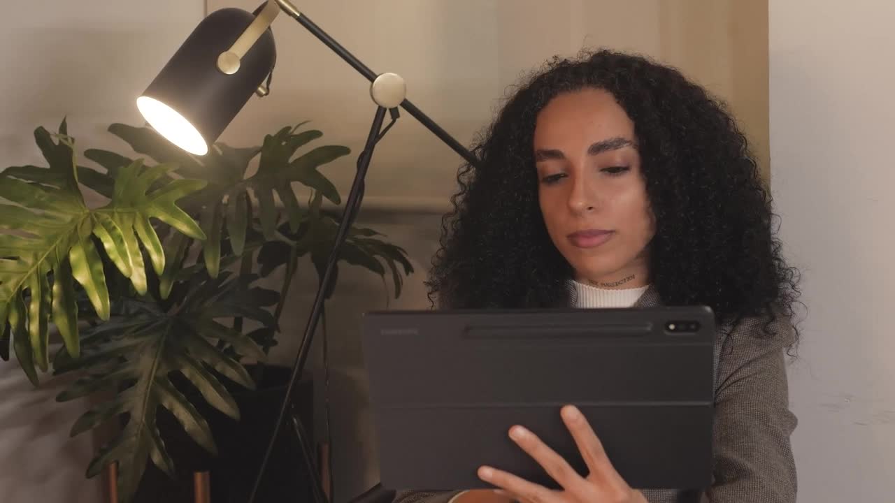 Download Free Stock Video Young Woman Having A Video Call By Tablet Live Wallpaper