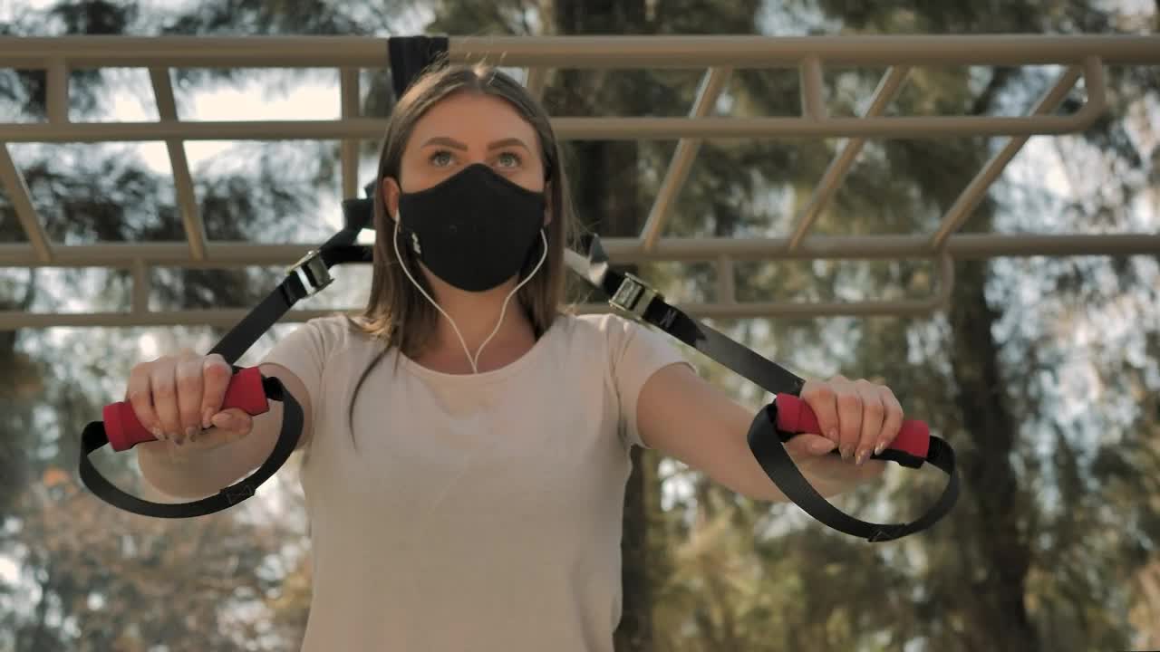 Download Free Stock Video Young Woman Exercising In The Park Live Wallpaper