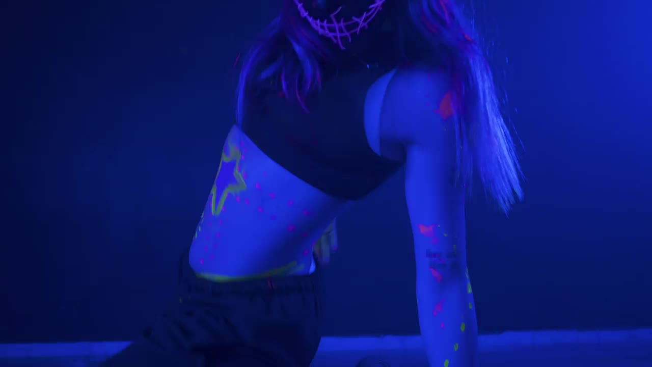 Download Free Stock Video Young Woman Dancing With A Mask Under A Party Light Live Wallpaper