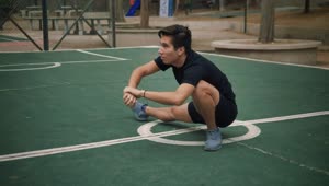 Free Stock Video Young Man Stretching On The Court In A Park Live Wallpaper