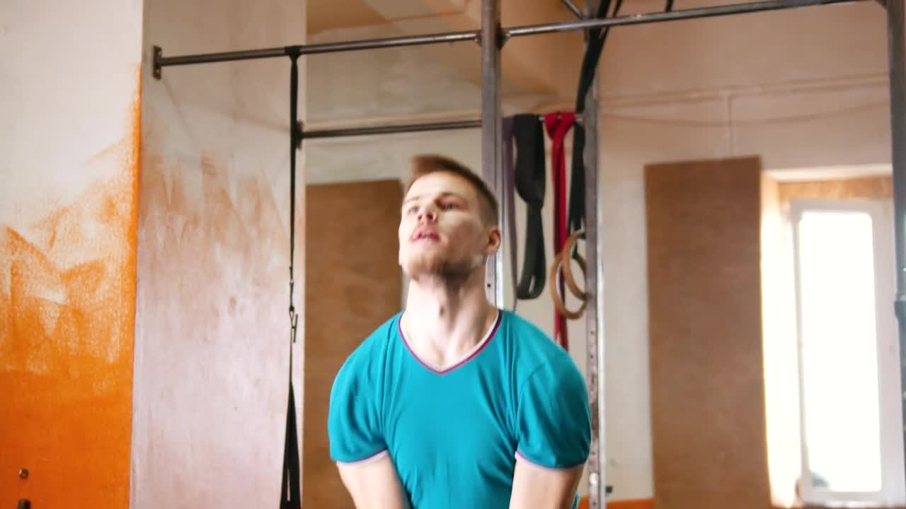 Download Free Stock Video Young Man Exercising With A Kettlebell Live Wallpaper