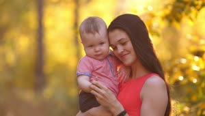 Free Stock Video Young Happy Mother With Her Baby In Nature Live Wallpaper