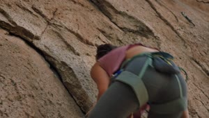 Free Stock Video Young Female Mountaineer Climbing A Rocky Mountain Live Wallpaper