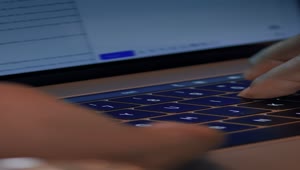 Free Stock Video Working On A Macbook Pro Live Wallpaper