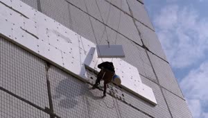 Free Stock Video Worker Suspended With Ropes On A Building Live Wallpaper
