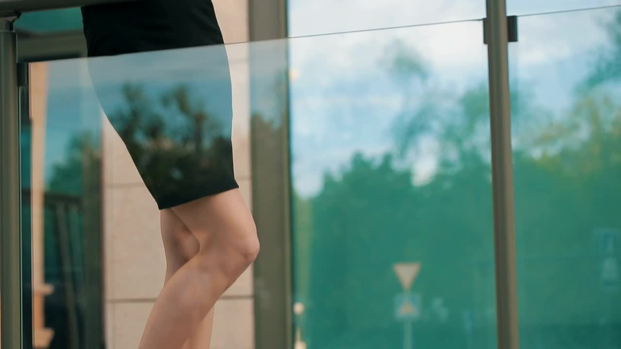 Download Free Stock Video Woman Working On Her Tablet Outside The Office Live Wallpaper