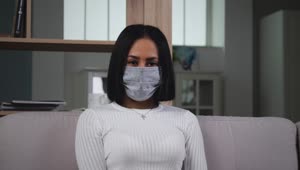 Free Stock Video Woman With Medical Face Mask Looking To Camera Live Wallpaper