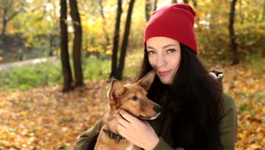 Free Stock Video Woman With Her Little Dog Looking At The Camera Live Wallpaper