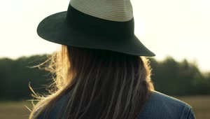 Free Stock Video Woman With A Hat Looking At The Sunset Live Wallpaper