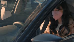 Free Stock Video Woman With A Face Mask Parking A Car Live Wallpaper