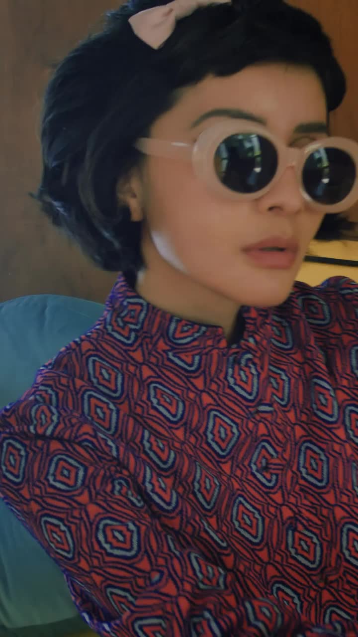 Download Free Stock Video Woman Taking A Selfie With A Retro Camera Live Wallpaper