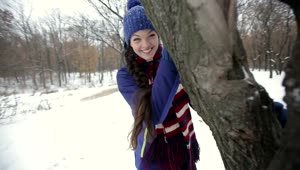 Free Stock Video Woman Playing Around A Tree During Winter Live Wallpaper