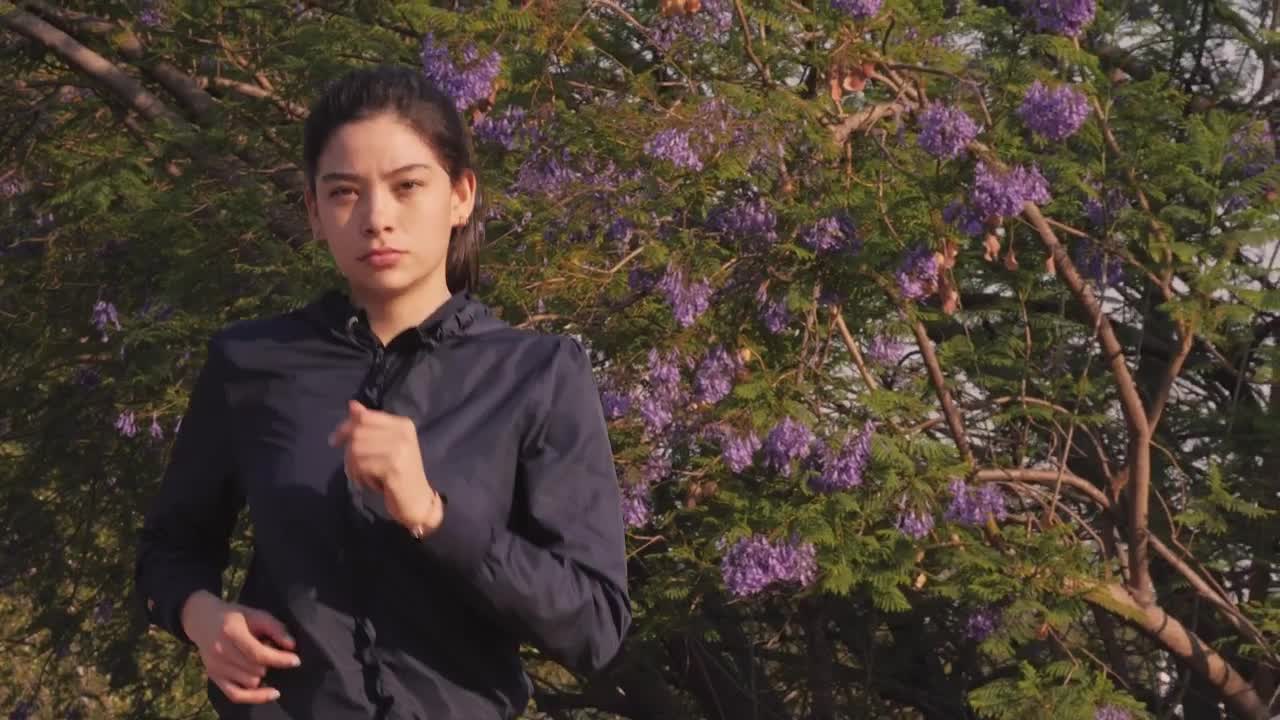 Download Free Stock Video Woman Jogging Head On Outdoors Live Wallpaper