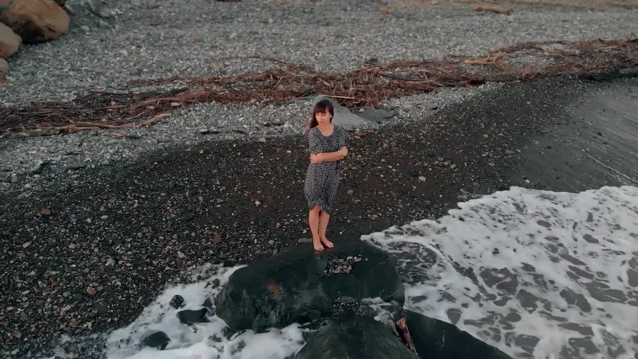 Download Free Stock Video Woman In Dress Looking At The Sea On The Beach Live Wallpaper