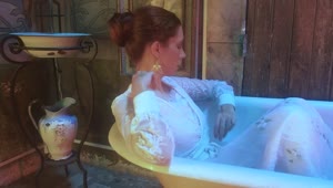Free Stock Video Woman In A White Dress Models In A Bathtub Live Wallpaper