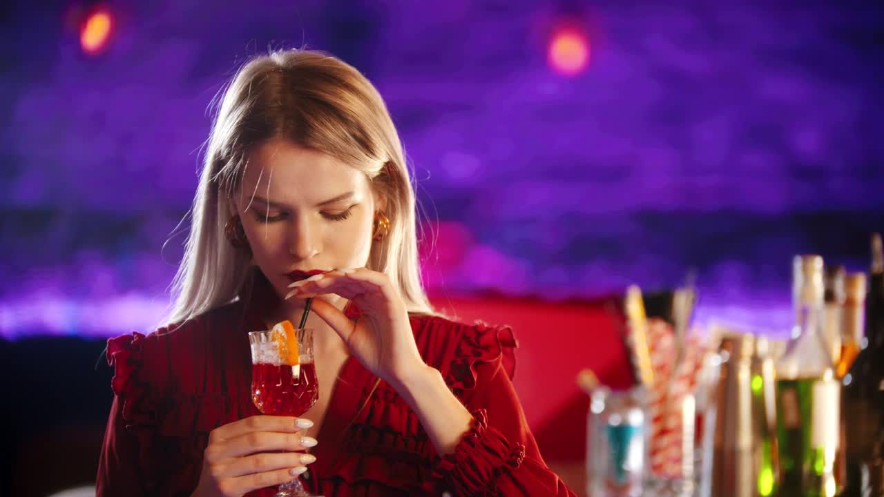 Download Free Stock Video Woman Having A Drink In A Bar Live Wallpaper