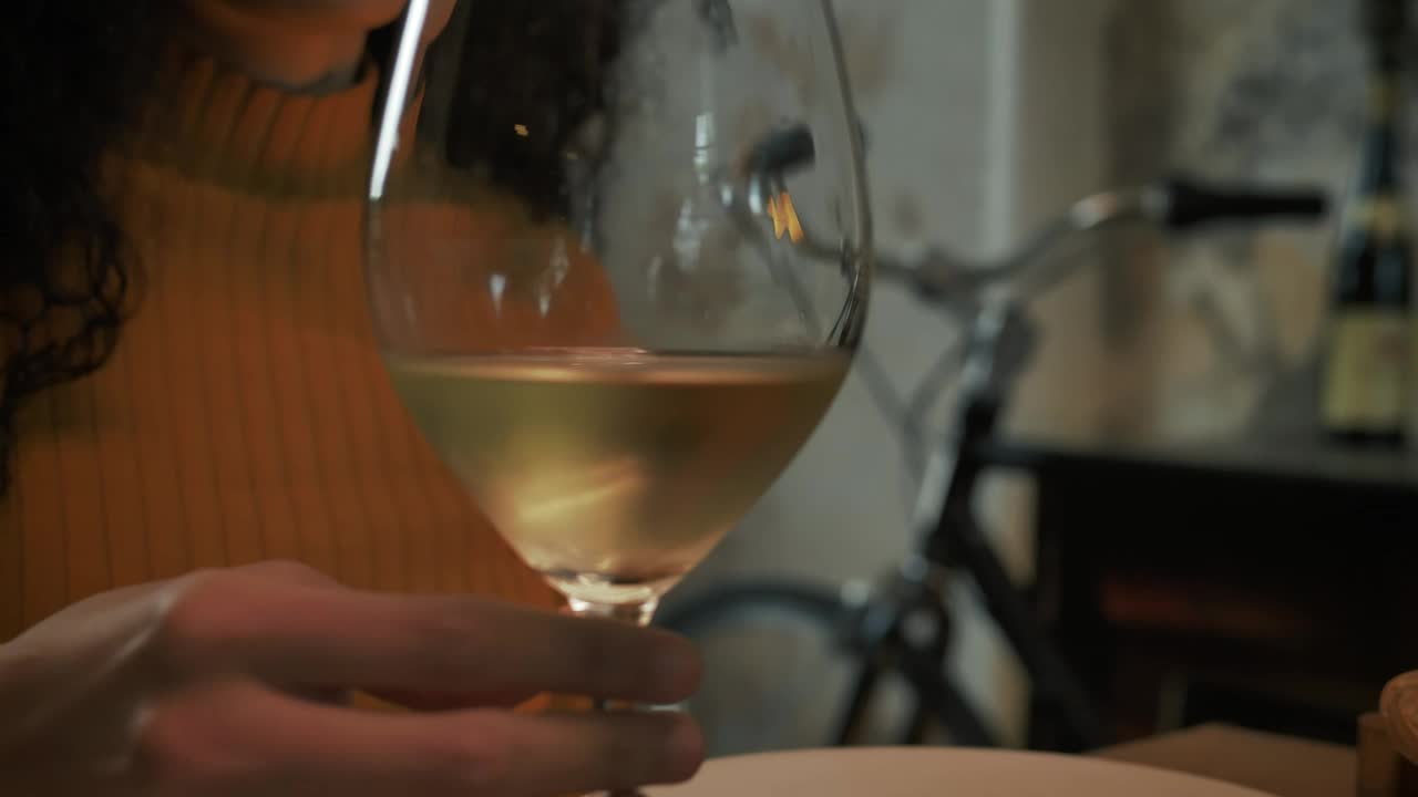 Download Free Stock Video Woman Drinking Cold White Wine From A Glass Live Wallpaper
