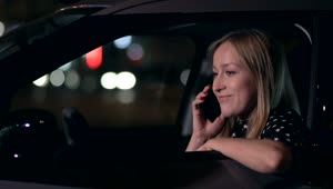 Free Stock Video Woman Answering A Call In Her Car At Night Live Wallpaper