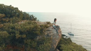 Free Stock Video Woman Admiring The Sea From A Cliff Live Wallpaper
