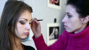   Stock Footage Woman Applying Makeup Live Wallpaper