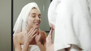   Stock Footage Woman Admires Reflection After Shower Live Wallpaper