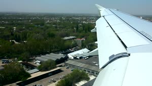   Stock Footage Window View Of An Airplane Landing In The Airport Live Wallpaper