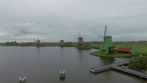   Stock Footage Windmills Along A River Live Wallpaper
