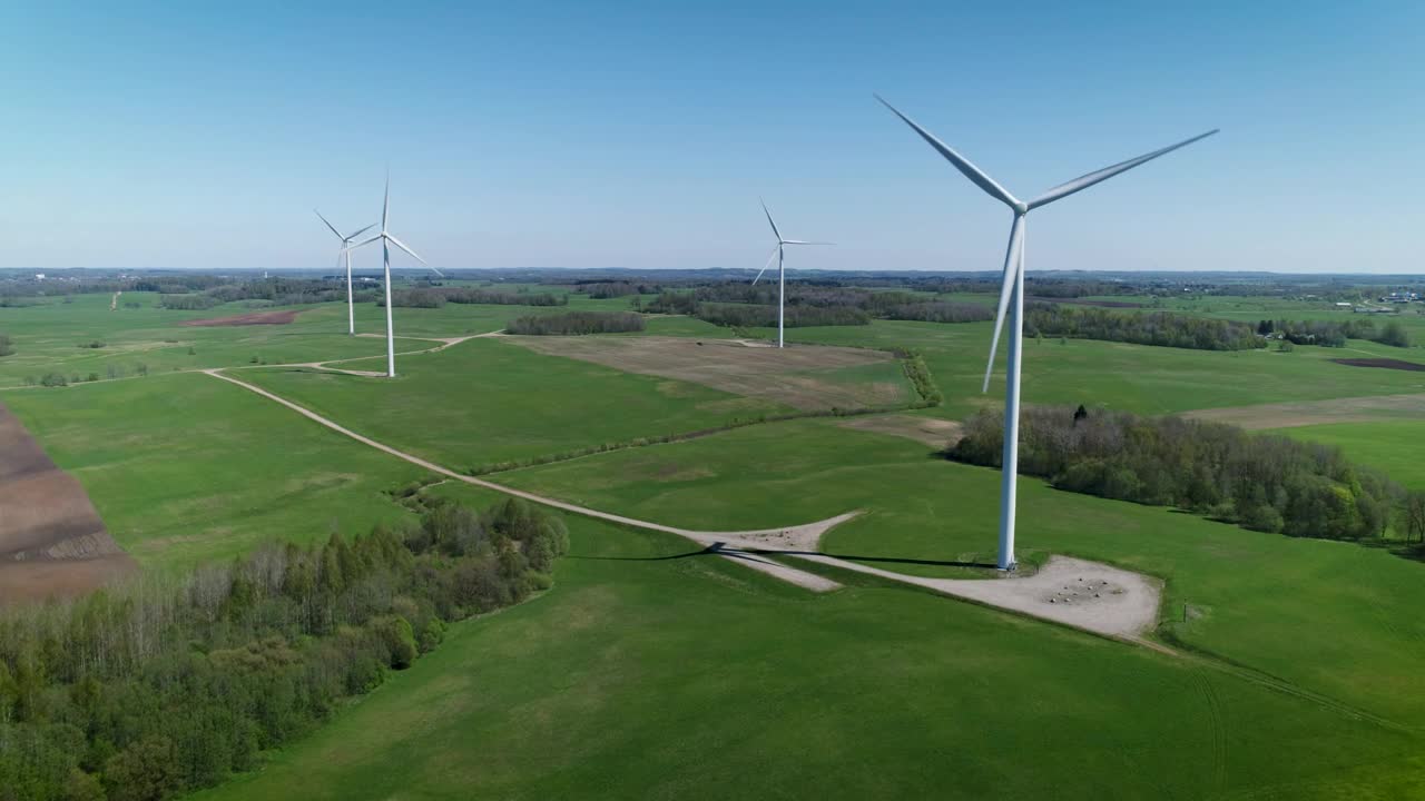 Download   Stock Footage Wind Turbines On A Green Field Live Wallpaper