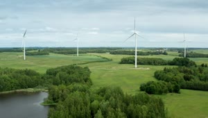   Stock Footage Wind Turbines Next To A Natural Lake Live Wallpaper