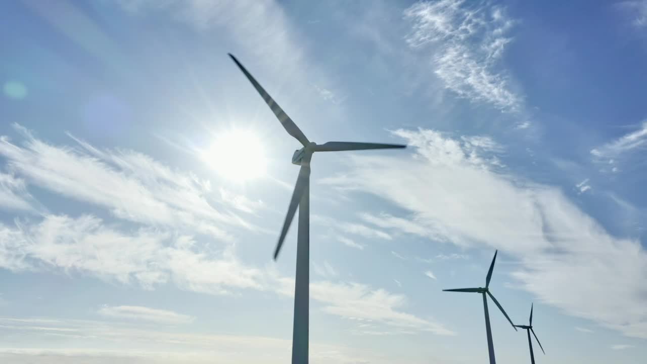 Download   Stock Footage Wind Turbines And A Blue Sky Live Wallpaper