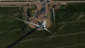   Stock Footage Wind Turbine Under Repair Aerial View Live Wallpaper
