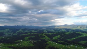   Stock Footage Wide Aerial View Of A Mountainous Valley Landscape Live Wallpaper