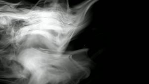   Stock Footage White Smoke Floating In Front Of A Black Background Live Wallpaper