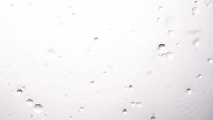   Stock Footage White Bubbles Dripping Down Live Wallpaper