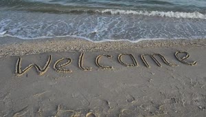   Stock Footage Welcome In The Sand At The Seashore Live Wallpaper