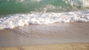   Stock Footage Waves Rolling Over Sand Live Wallpaper