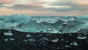   Stock Footage Waves Breaking Over Ice In The Ocean Shore Live Wallpaper