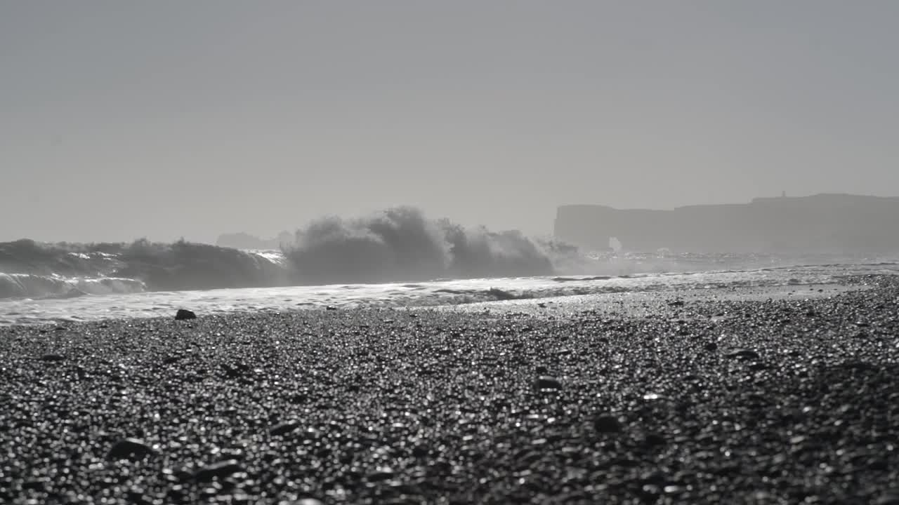 Download   Stock Footage Waves Breaking Over Black Sand Live Wallpaper