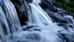   Stock Footage Waterfall Over Black Stones Live Wallpaper