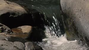   Stock Footage Water Falls Between Rocks Live Wallpaper