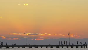  Stock Footage Watching The Sun Go Down From A Pier Live Wallpaper
