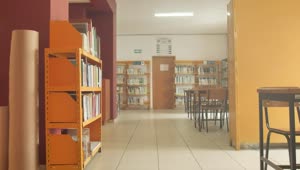   Stock Footage Walking Down A Library Corridor With Tables And Bookcases Live Wallpaper