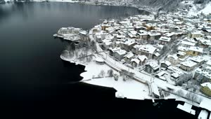   Stock Footage View Of A Snowy Town And A Lake Live Wallpaper