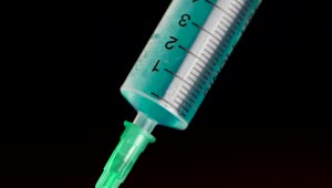   Stock Footage Vaccine Inside A Syringe Live Wallpaper