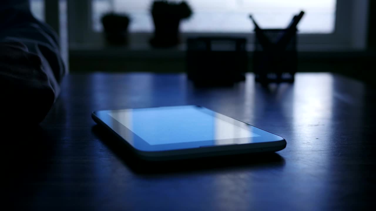 Download   Stock Footage Using Tablet At Night Live Wallpaper