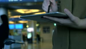   Stock Footage Using A Tablet At An Airport Live Wallpaper