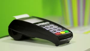   Stock Footage Using A Bank Terminal During A Card Payment Live Wallpaper