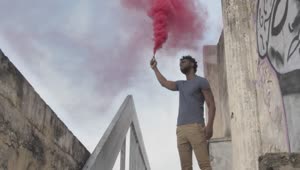   Stock Footage Urban Man Holding A Smoke Bomb Live Wallpaper