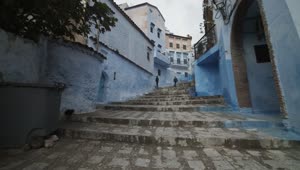   Stock Footage Up The Steps Of An Ancient Alley Painted Blue Live Wallpaper