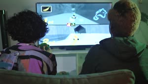   Stock Footage Two Young People Playing Video Games Live Wallpaper